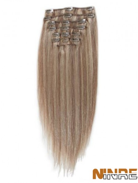 Grande pince à cheveux remy blonde droite dans les extensions de cheveux