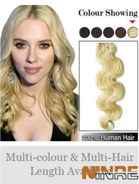 Extensions de trame à la mode blonde ondulée Remy cheveux humains